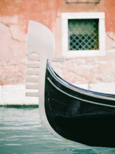 Photo of a close-up of a gondola on water in Venice